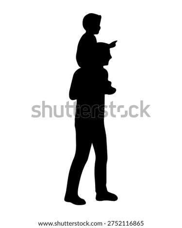 Father and son create a silhouette while walking with child riding on shoulders