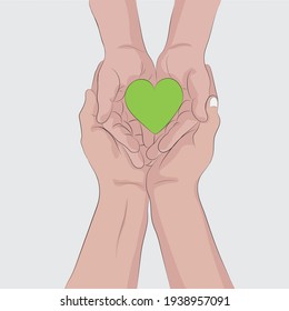 Father and son hand holding a green heart symbolic representation.