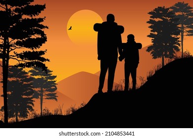 father and son hiking together silhouette