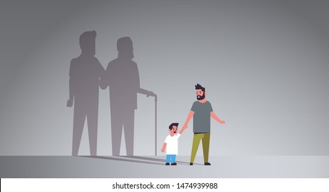 father with son holding hands dreaming about future shadow of young and mature man standing together imagination aspiration concept full length flat horizontal