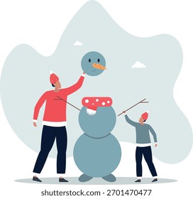 Vater und Sohn machen einen Schneemann. Winterspaß für die Familie.