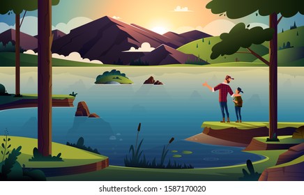 Father and son on the shore of a beautiful lake in the forest at sunrise or sunset overlooking the mountains and hills.