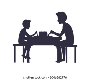 Father and son playing chess sitting on chairs at table black silhouettes isolated on white. Fatherhood dad spend free time with child vector