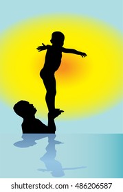 Father and son playing in sunset 