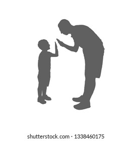 Father and son silhouette. The man leaned over the boy and clapped his hands.