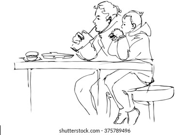 father and son at the table in a cafe