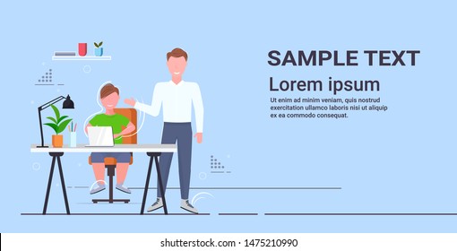 father and son using laptop at workplace man helping his child to do homework flat full length horizontal copy space