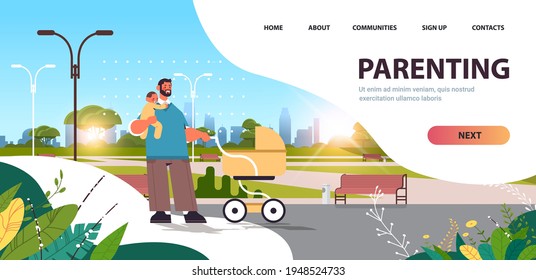 father walking outdoor with little baby son fatherhood parenting concept dad spending time with kid