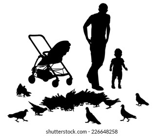 Father walks with the baby in the stroller. They feed the pigeons