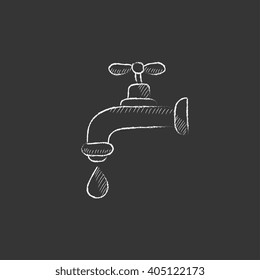 Faucet with water drop. Drawn in chalk icon.