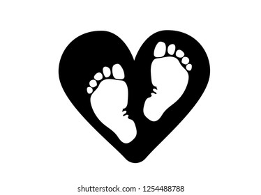 
Favorite baby legs on the background of the heart. The concept of love, protection and motherhood. Children Protection Day. 