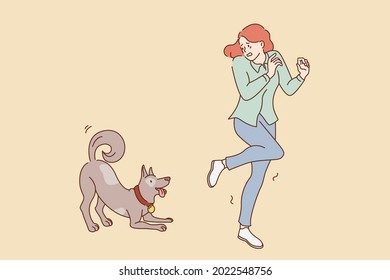 Fear of dogs animals concept. Young stressed girl feeling afraid running away from friendly playing dog outdoors vector illustration 