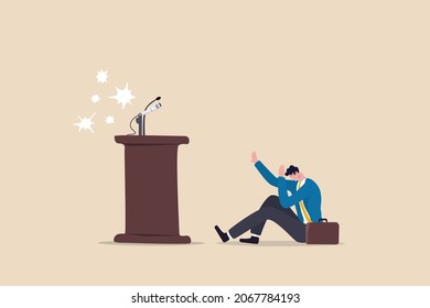 Fear of public speaking, nervous or stress to talk on stage, podium phobia, shy and frightening to give speech to people, fearful nervous businessman sitting hidden behind public speaking podium.