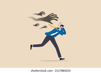 Fear or struggle from business failure, anxiety, depression or panic attack, afraid or negative feeling, mental disorder concept, frightened businessman running away from creepy monster hand chasing.