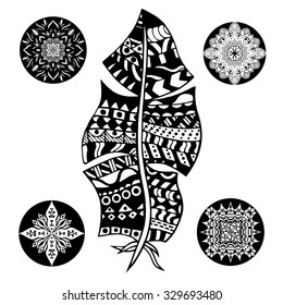 Feather and mandalas on a white background. Vintage, tribal, artistically drawn, zentangle, stylized feather. Sketch by trace. Pattern for coloring book.