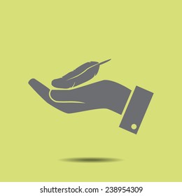 Feather on the hand vector icon