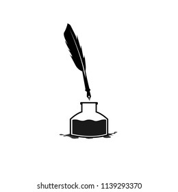 Feather pen into the inkwell. Isolated on a white background.