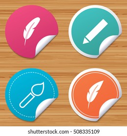Feather retro pen signs. Brush and pencil icons.
