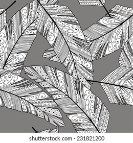 Feather seamless background. Hand drawn vector illustration vintage pattern