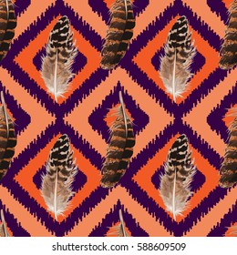 Feather Seamless Pattern isolated on lilly and orange squared background. Fashion boho textile print.