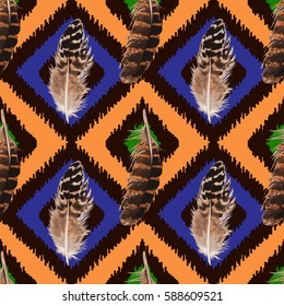 Feather Seamless Pattern isolated on brown, blue and orange squared background. Fashion boho textile print.