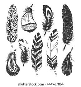 Feather set in Native American Indian style. Vector hand drawn hipster illustration isolated on white background. Boho design, tattoo art, coloring book for adults.