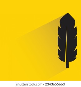 plumas con sombra sobre fondo amarillo