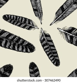 Feathers. Drawing by hand. Sketch. Figure in the ethnic style. Seamless pattern.