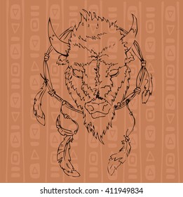 Feathers and the head of a Buffalo on anbrown  background with ethnic pattern. Vector illustration