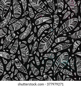 Feathers seamless pattern. Tribal ornament. Ethnic pattern.Ethnic retro design with feathers in zentangle style with abstract ornament for textile, fashion fabric, wallpaper, wrapping paper etc