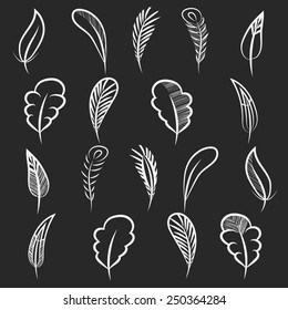 Feathers vector set 1. White on black background