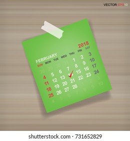 February 2018 calendar - Green calendar paper stick on wood background. Vector illustration.