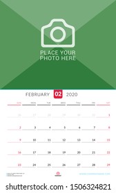 February 2020. Wall calendar planner with place for photo. Vector design print template. Week starts on Sunday