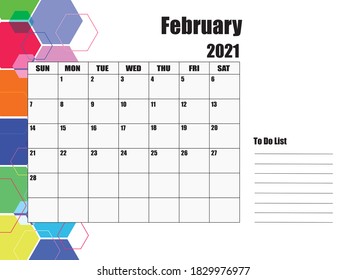 February 2021 Calendar, white background on the left, hexagons of various sizes and colors