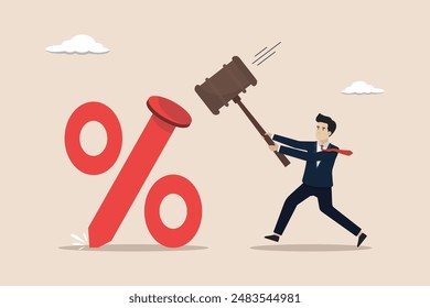 Federal Reserve low interest rates, economic recovery concept, FED leader businessman using a hammer to nail a percentage sign to the floor.