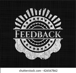 Feedback chalkboard emblem on black board