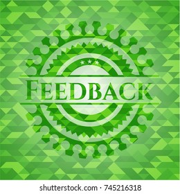 Feedback green emblem. Mosaic background