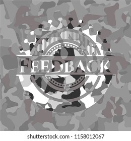 Feedback grey camouflaged emblem