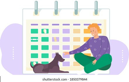 Feeding the pet on a timetable. The dog lies on the floor next to the owner sitting at big calendar. Woman taking care of the puppy, stroking him with her hand. Love for domestic animal little friend