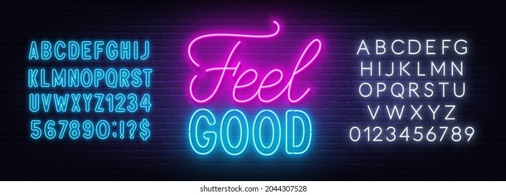 Feel Good neon lettering on brick wall background.