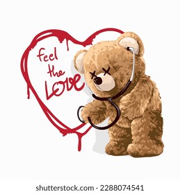 feel the love calligraphy slogan with bear doll wearing stethoscope scope on heart shape background