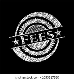 Fees chalk emblem written on a blackboard