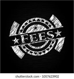 Fees chalk emblem written Fees chalk emblem written on a blackboardon a blackboard