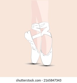 
feet of ballerina standing on tiptoes in white ballet shoes with ribbons