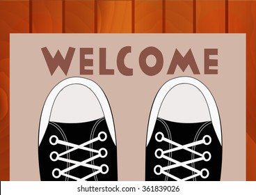 Feet teen in sneakers close up on a doorway rug that says "Welcome" in front of the house