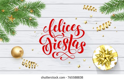 Felices Fiestas Navidad Spanish Happy Holidays golden decoration and calligraphy font for greeting card white wooden background. Vector Christmas or New Year golden shiny gift Xmas decoration design