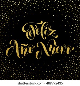 Feliz Ano Nuevo gold glitter modern lettering for Spanish Happy New Year greeting holiday card. Vector hand drawn festive text for banner, poster, invitation on black background.