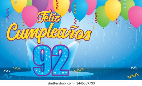 Feliz Cumpleanos 92 - Happy Birthday in Spanish language - Greeting card. Candle lit in the form of a number being lit by reflectors in a room with balloons floating with streamers and confetti