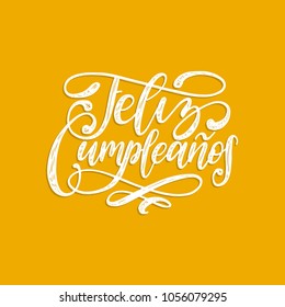 Feliz Cumpleanos translated from Spanish Happy Birthday hand lettering. Vector illustration on yellow background. Used for invitation, greeting card etc.