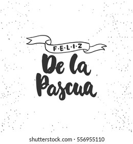 Feliz de la Pascua - lettering on spanish what means Happy Easter calligraphy phrase isolated on the background. Fun brush ink typography for photo overlays, t-shirt print, poster design.